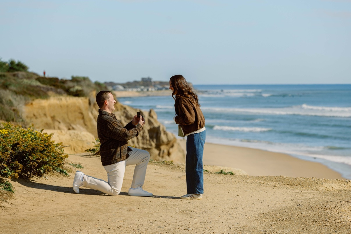 Surprise proposal at Shadmoor State Park, Montauk, Long Island — on one knee on the bluff path above the ocean, the ring box open